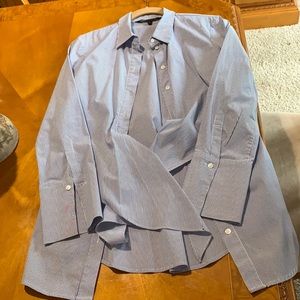 A long striped long shirt with a tie.